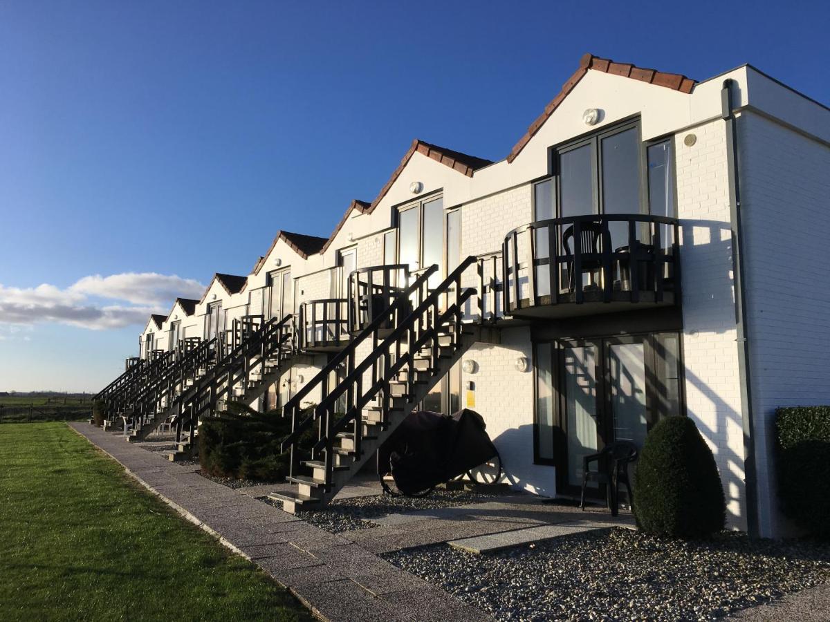 Knus Appartement Met Zicht Op Zeepolder De Haan Dış mekan fotoğraf